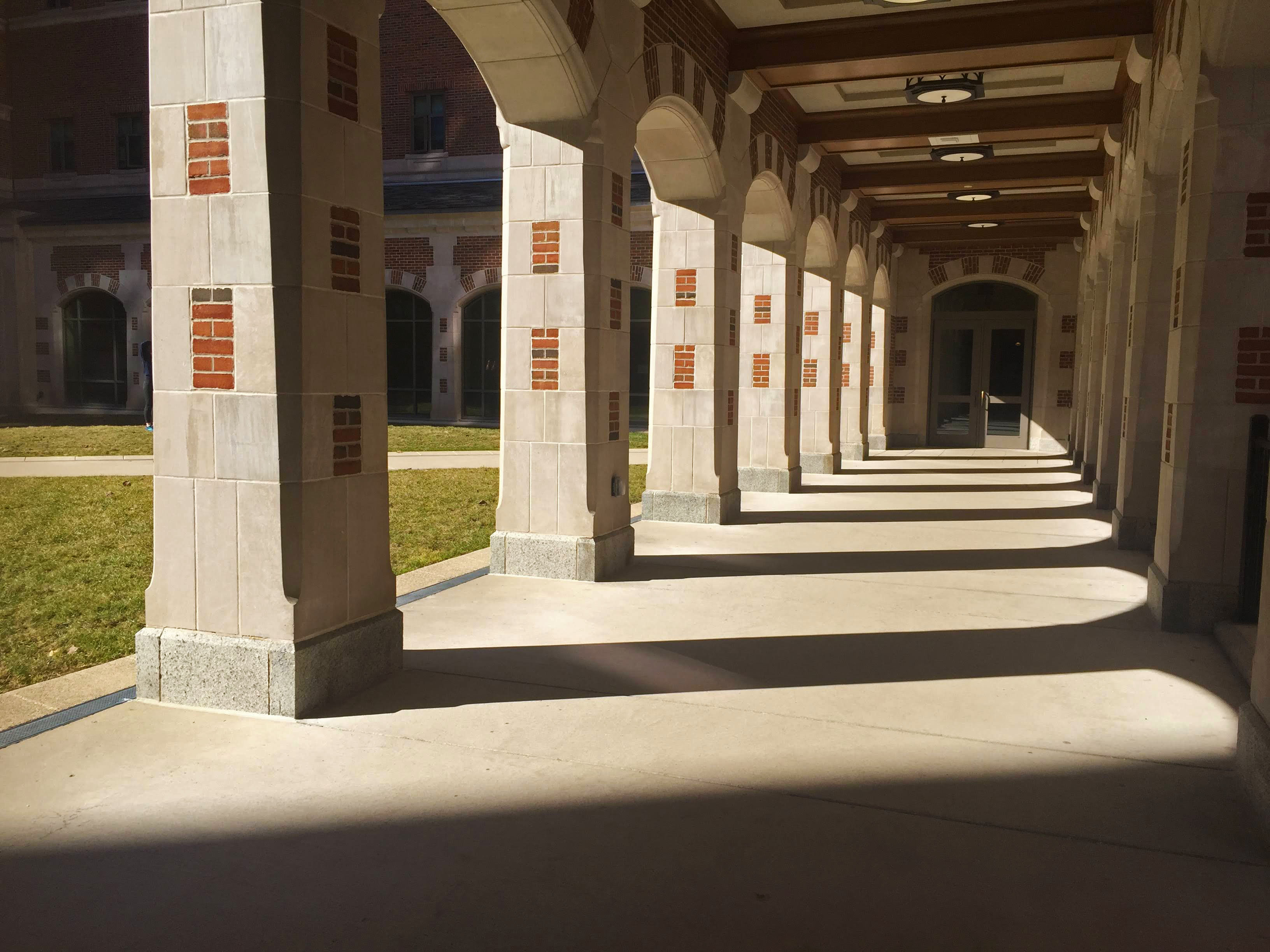 sunlight streaming through North Quad pillars - Ann Arbor, Michigan